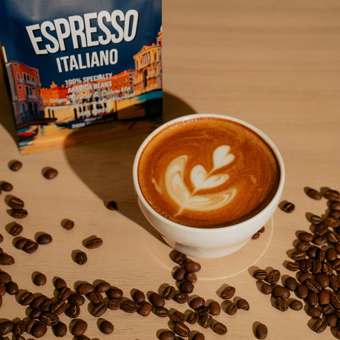 Espresso Italiano coffee packaging with a cup of cappuccino and coffee beans on a wooden surface