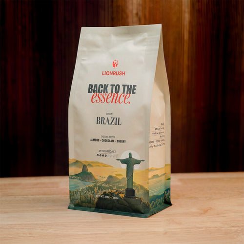 Coffee bag with Lionrush branding and a scenic design on a wooden surface