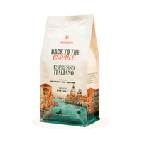 Coffee bag labeled 'Back to the Essence Espresso Italiano' with scenic design on a white background