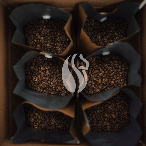 open bags of coffee with lionrush logo